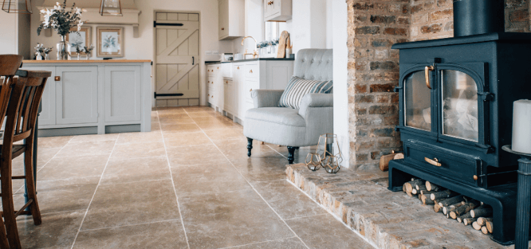 Creating a cosy home when you have natural stone flooring